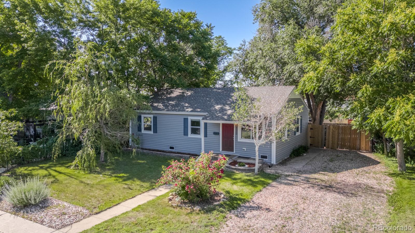 2260 Lilly Drive Thornton, CO 80229 - Photo 31 of 33 front view of a house with a yard