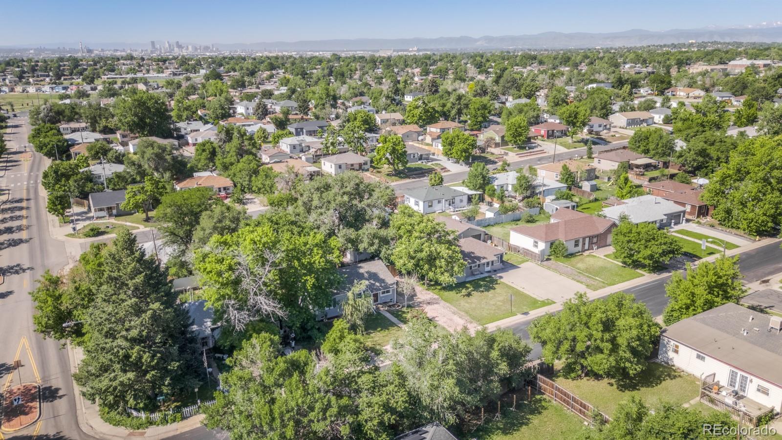 2260 Lilly Drive Thornton, CO 80229 - Photo 33 of 33 an aerial view of residential houses with outdoor space and trees