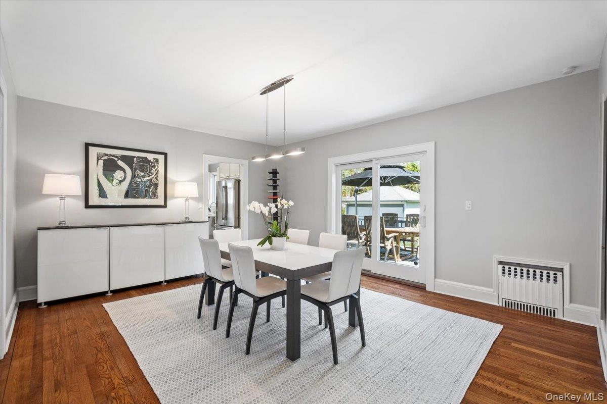 337 Heathcote Road Scarsdale, NY 10583 - Photo 8 of 33 Spacious dining room w/sliders to deck