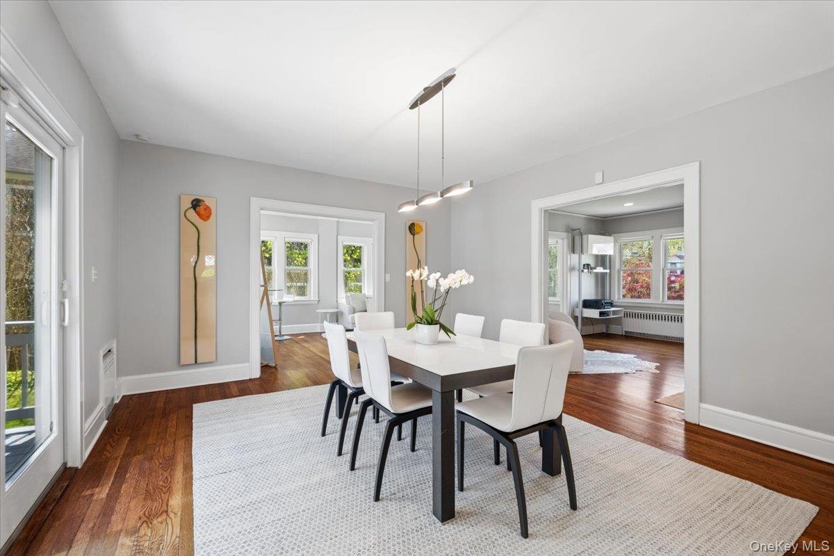 337 Heathcote Road Scarsdale, NY 10583 - Photo 9 of 33 Spacious dining room w/sliders to deck