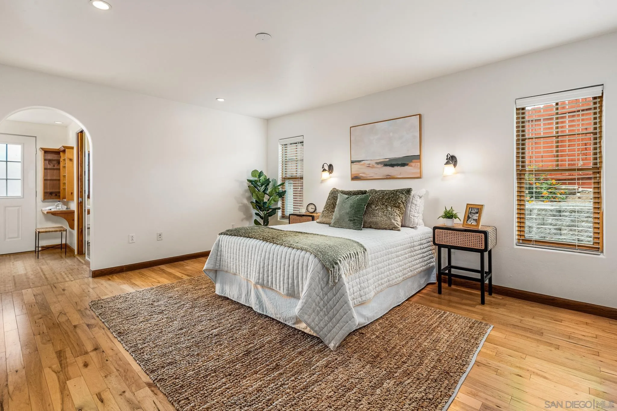 15315 Jenell Street Poway, CA 92064 - Photo 12 of 24 a bedroom with a bed and wooden floor