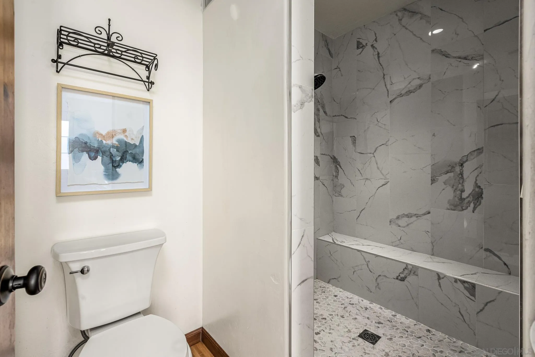 15315 Jenell Street Poway, CA 92064 - Photo 16 of 24 a bathroom with a toilet and a shower