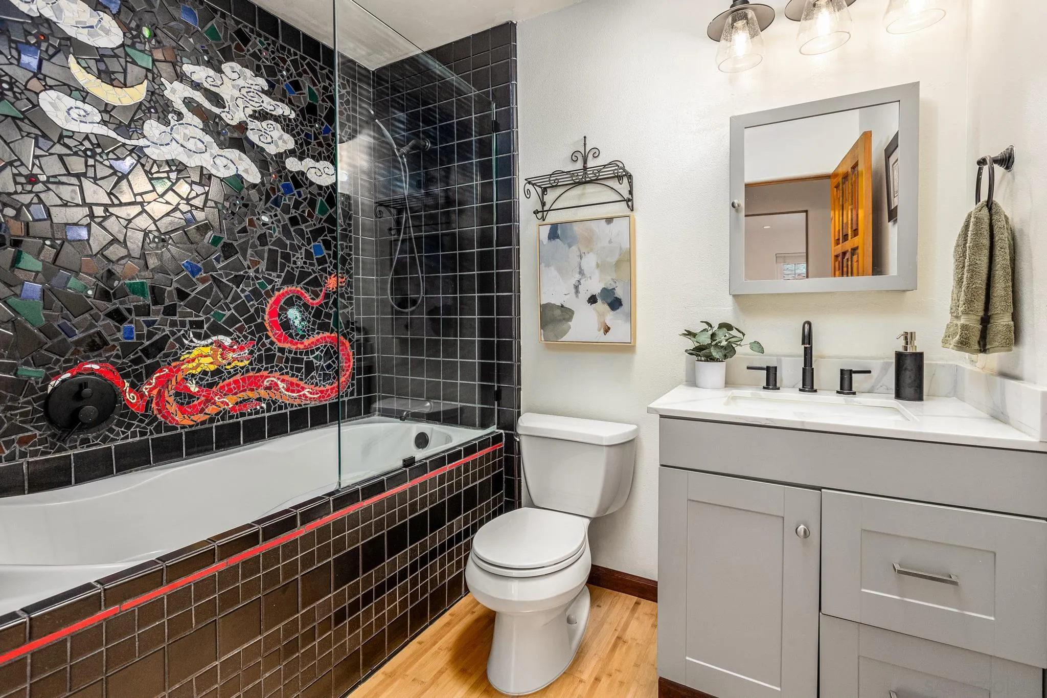 15315 Jenell Street Poway, CA 92064 - Photo 19 of 24 a bathroom with a sink toilet vanity and shower