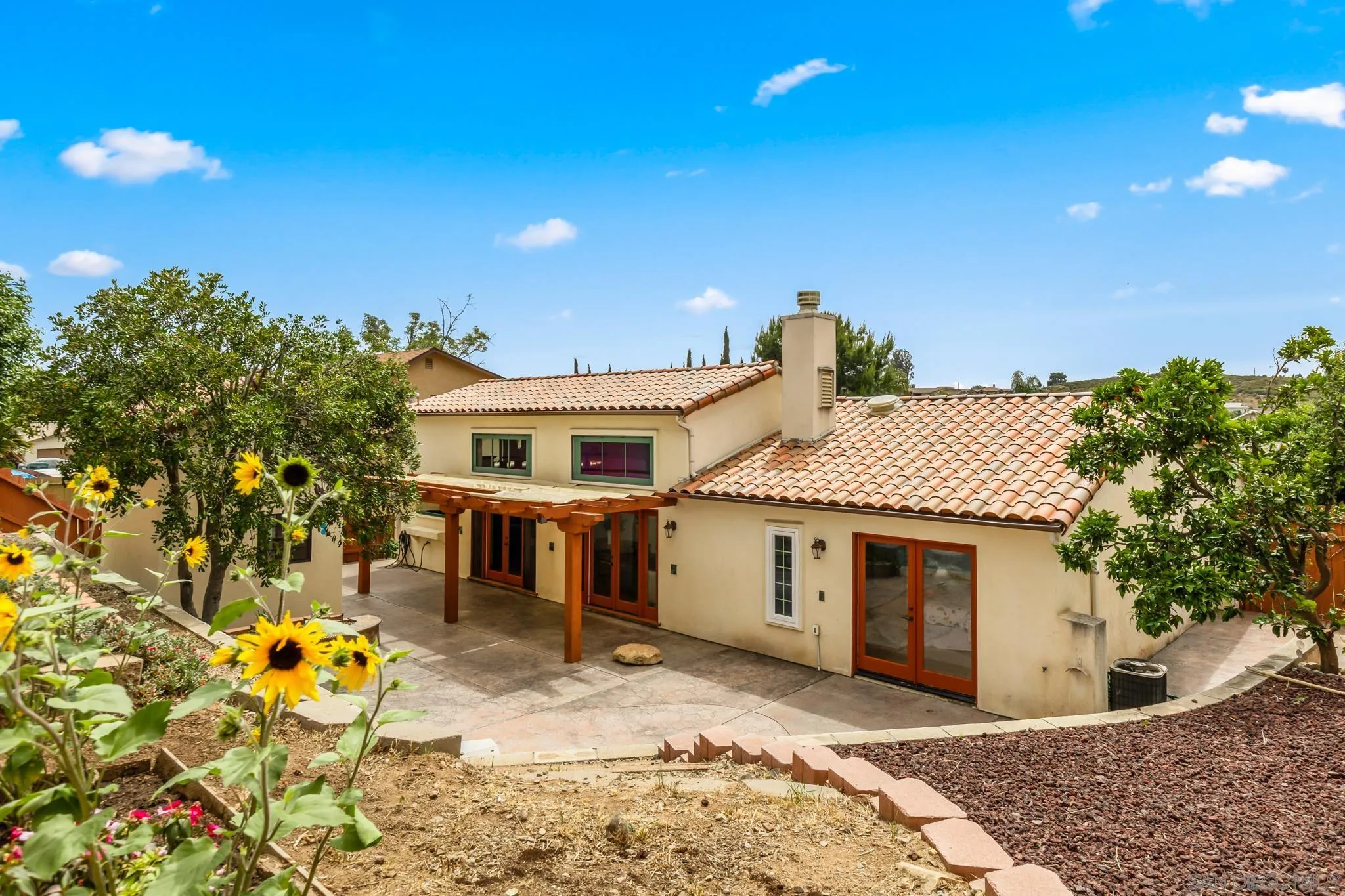 15315 Jenell Street Poway, CA 92064 - Photo 21 of 24 a front view of a house with a yard