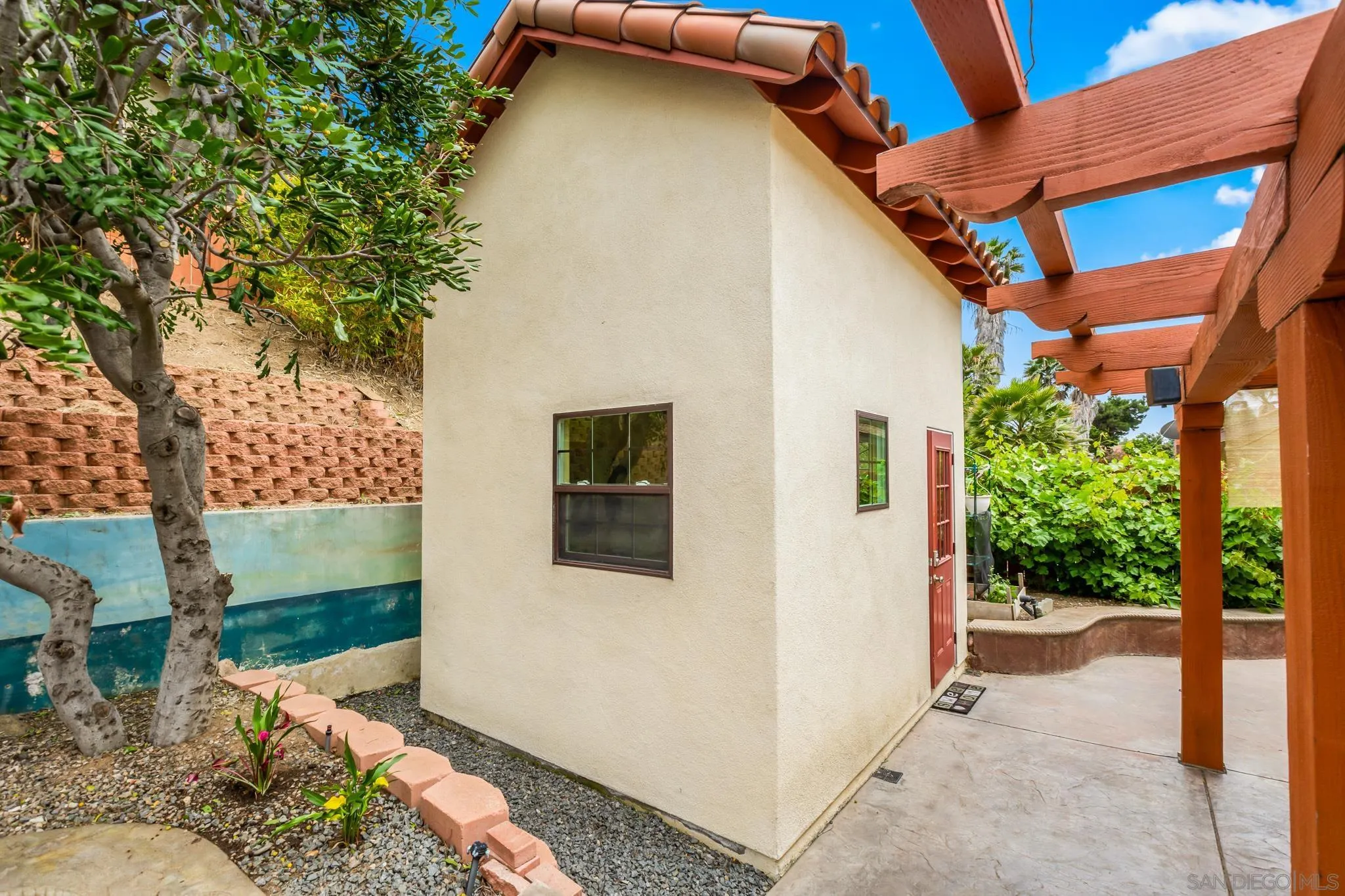 15315 Jenell Street Poway, CA 92064 - Photo 22 of 24 a view of a house with a yard