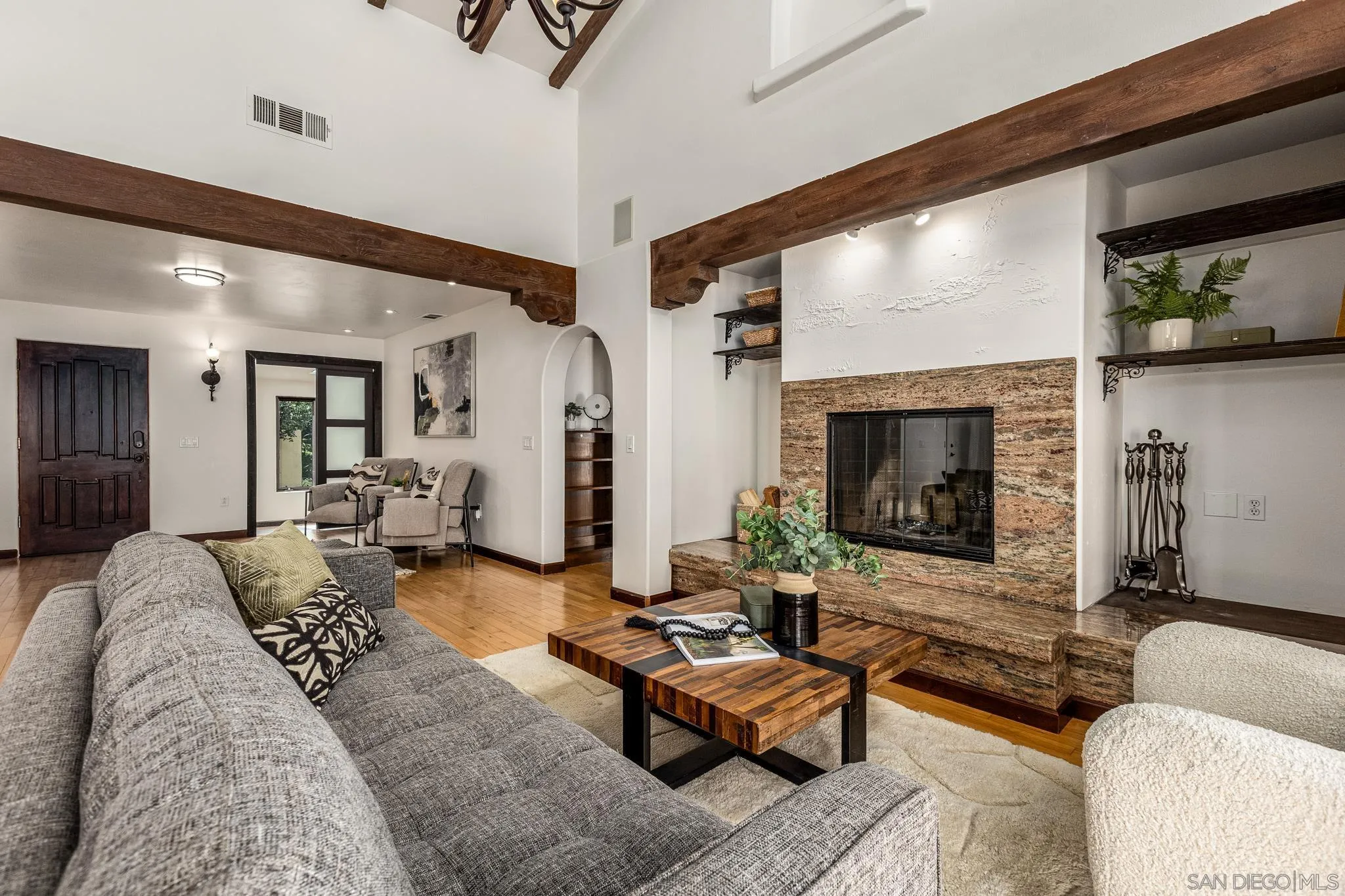 15315 Jenell Street Poway, CA 92064 - Photo 4 of 24 a living room with furniture and a fireplace