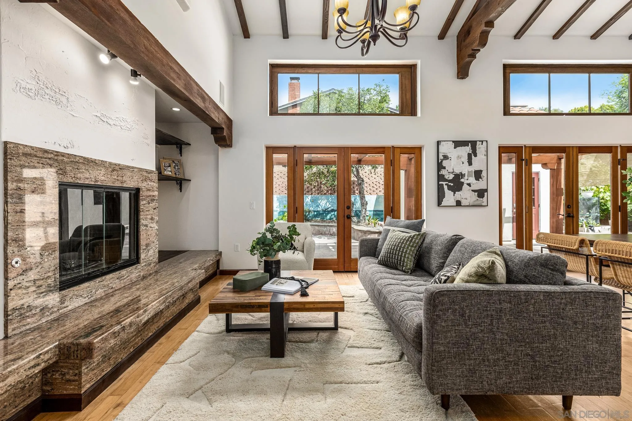 15315 Jenell Street Poway, CA 92064 - Photo 5 of 24 a living room with furniture wooden floor and a fireplace