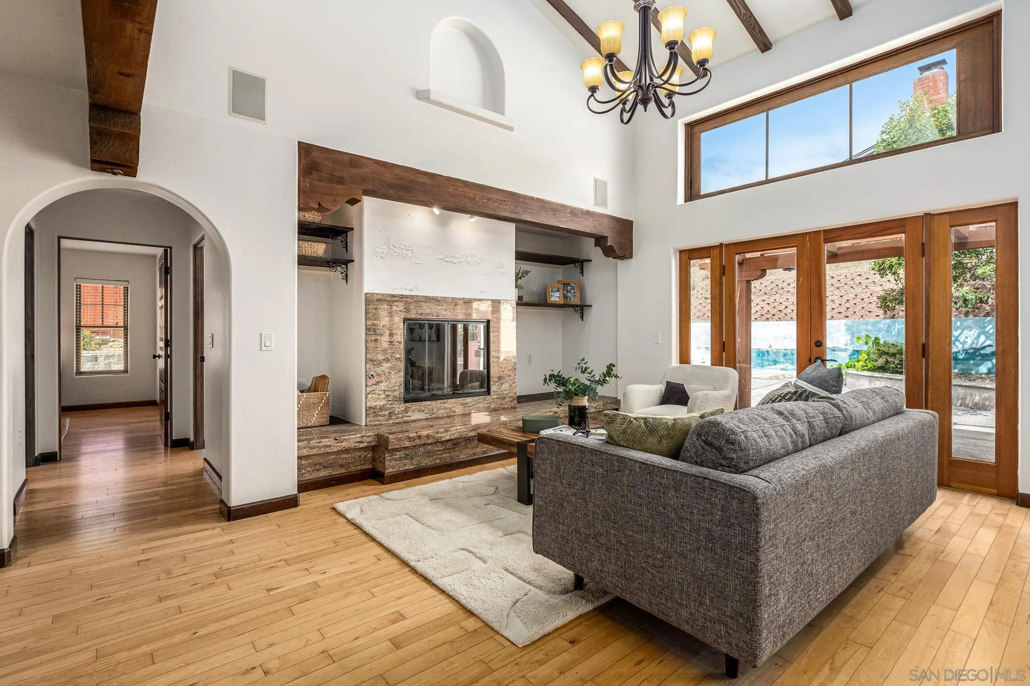 15315 Jenell Street Poway, CA 92064 - Photo 6 of 24 a living room with furniture and large windows