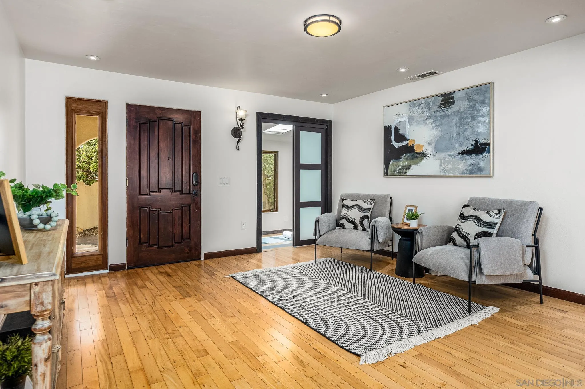 15315 Jenell Street Poway, CA 92064 - Photo 7 of 24 a living room with furniture and window