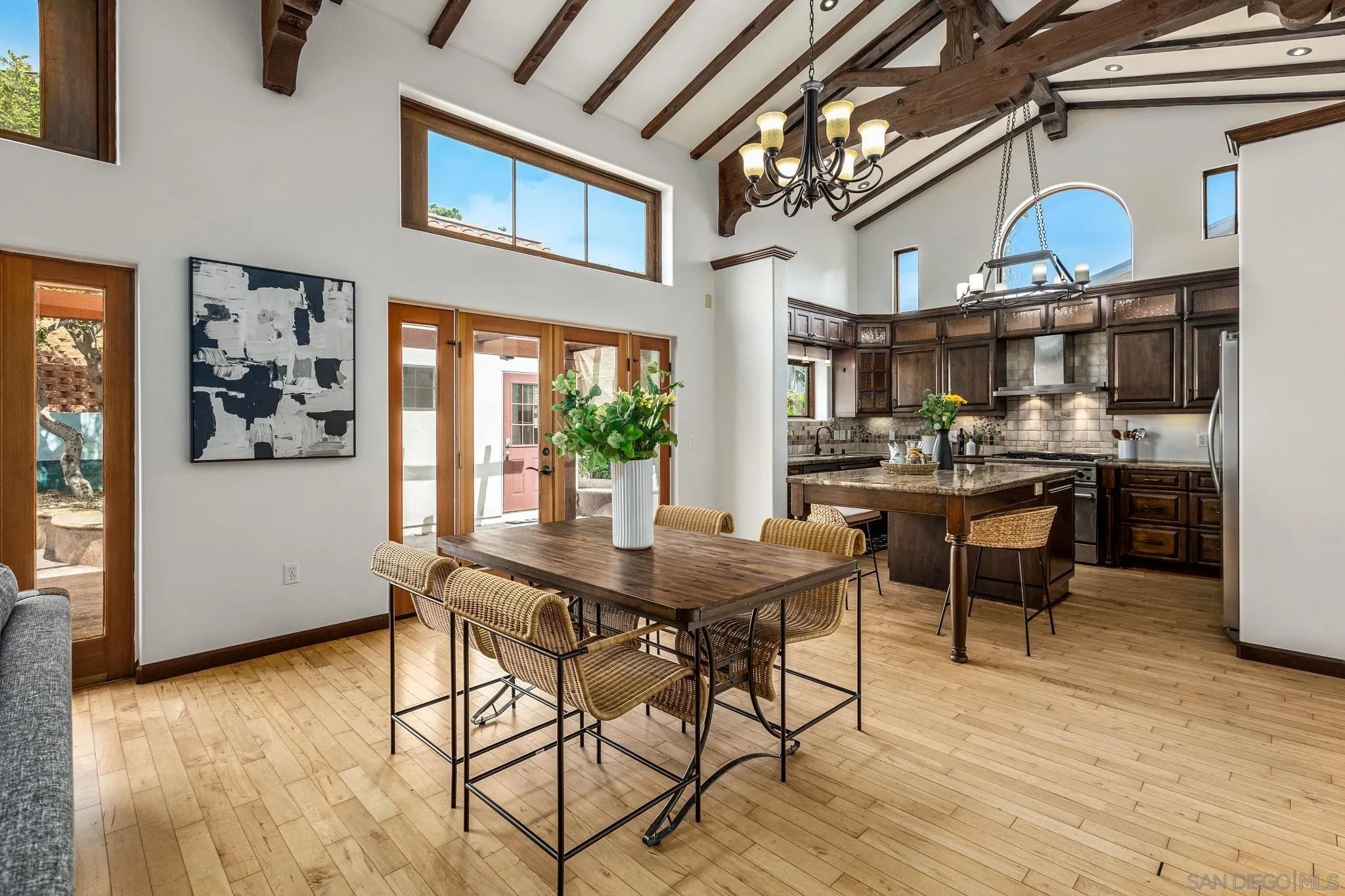 15315 Jenell Street Poway, CA 92064 - Photo 8 of 24 a view of a dining room with furniture and a chandelier