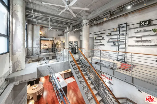 a bed room with a bed and a window