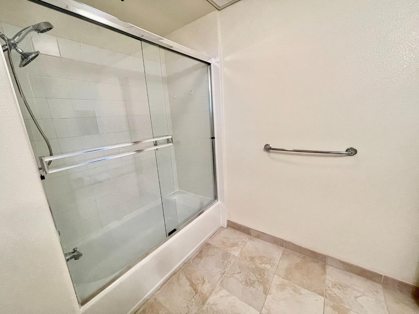 423 7th Street, Unit 516 Oakland, CA 94607 - Photo 18 of 21 a bathroom with a shower