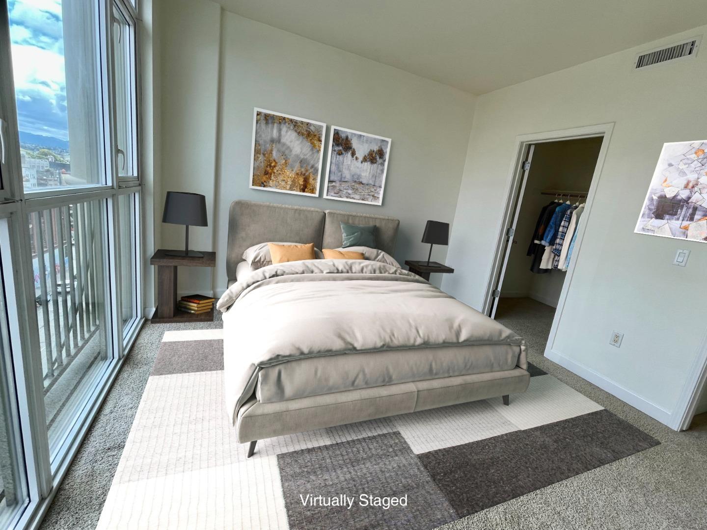 423 7th Street, Unit 516 Oakland, CA 94607 - Photo 19 of 21 a bedroom with a bed painting on wall and a large window