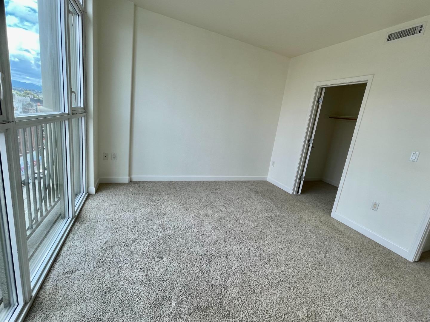 423 7th Street, Unit 516 Oakland, CA 94607 - Photo 20 of 21 an empty room with windows