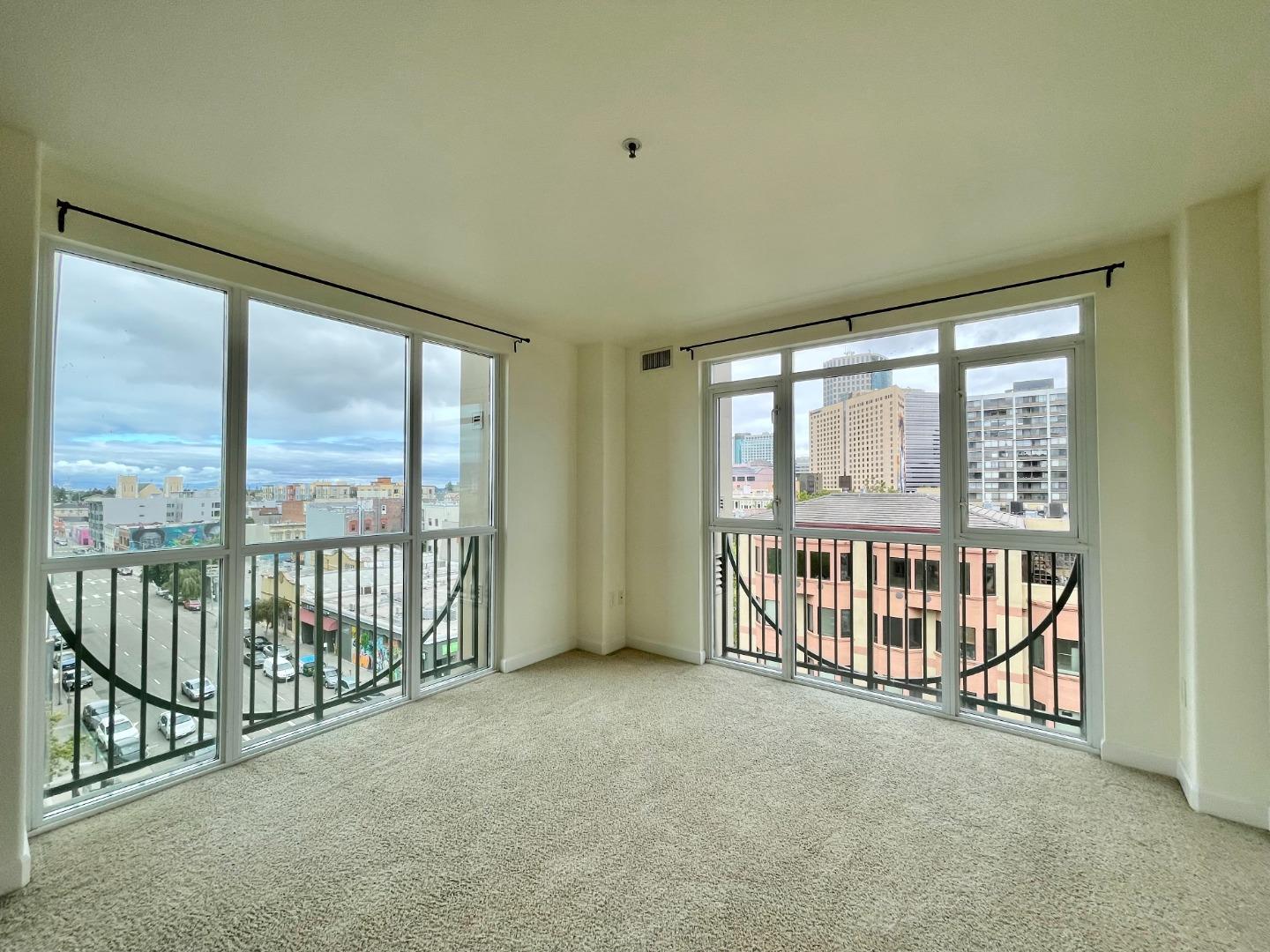 423 7th Street, Unit 516 Oakland, CA 94607 - Photo 2 of 21 a view of a big room with windows