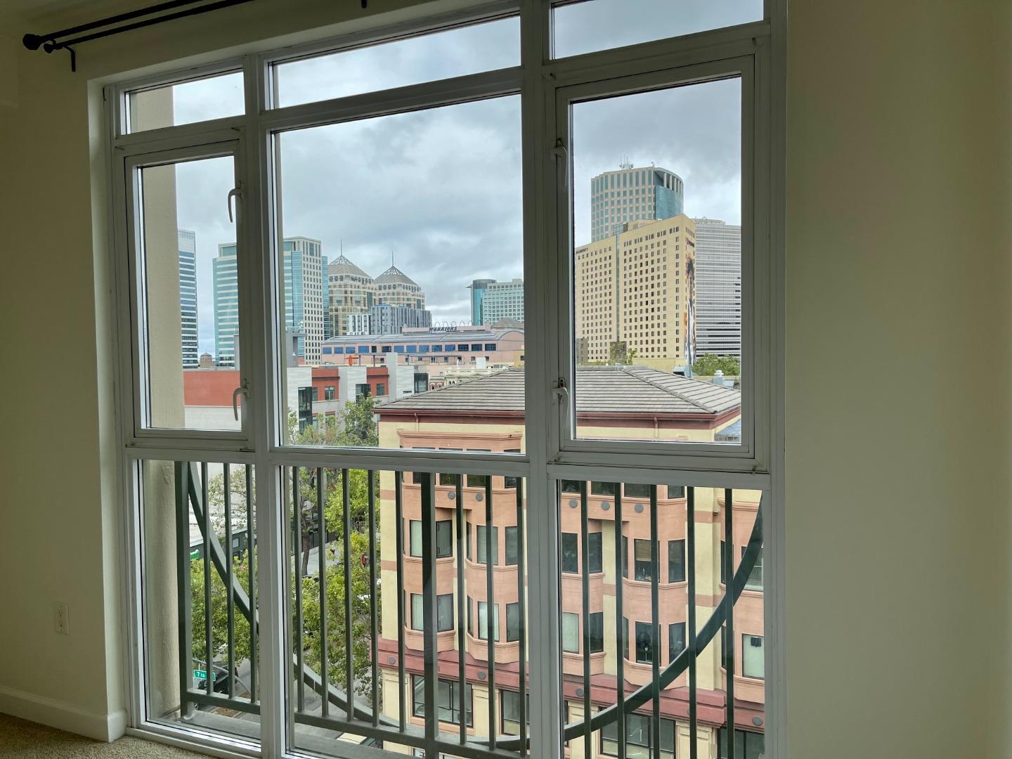 423 7th Street, Unit 516 Oakland, CA 94607 - Photo 6 of 21 a view of a balcony with furniture
