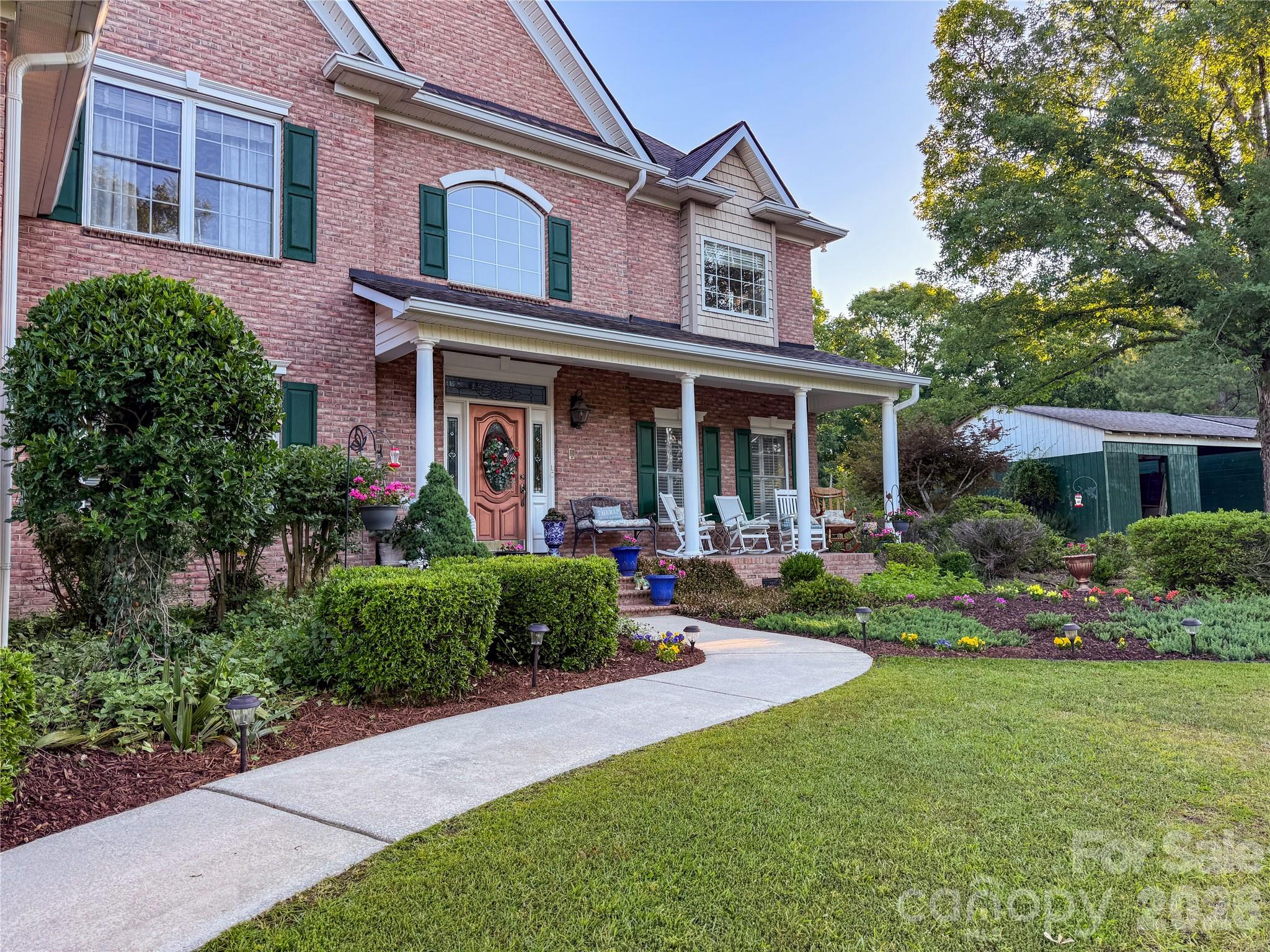 1171 State Rd S-29-376 Lancaster, SC 29720 - Photo 10 of 48 front view of a brick house with a yard