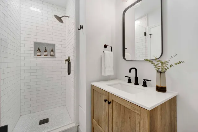 a bathroom with a sink and a mirror
