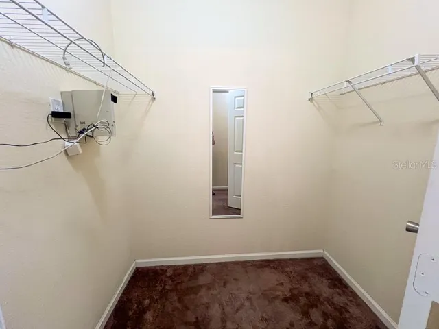 a bathroom with a window and shower