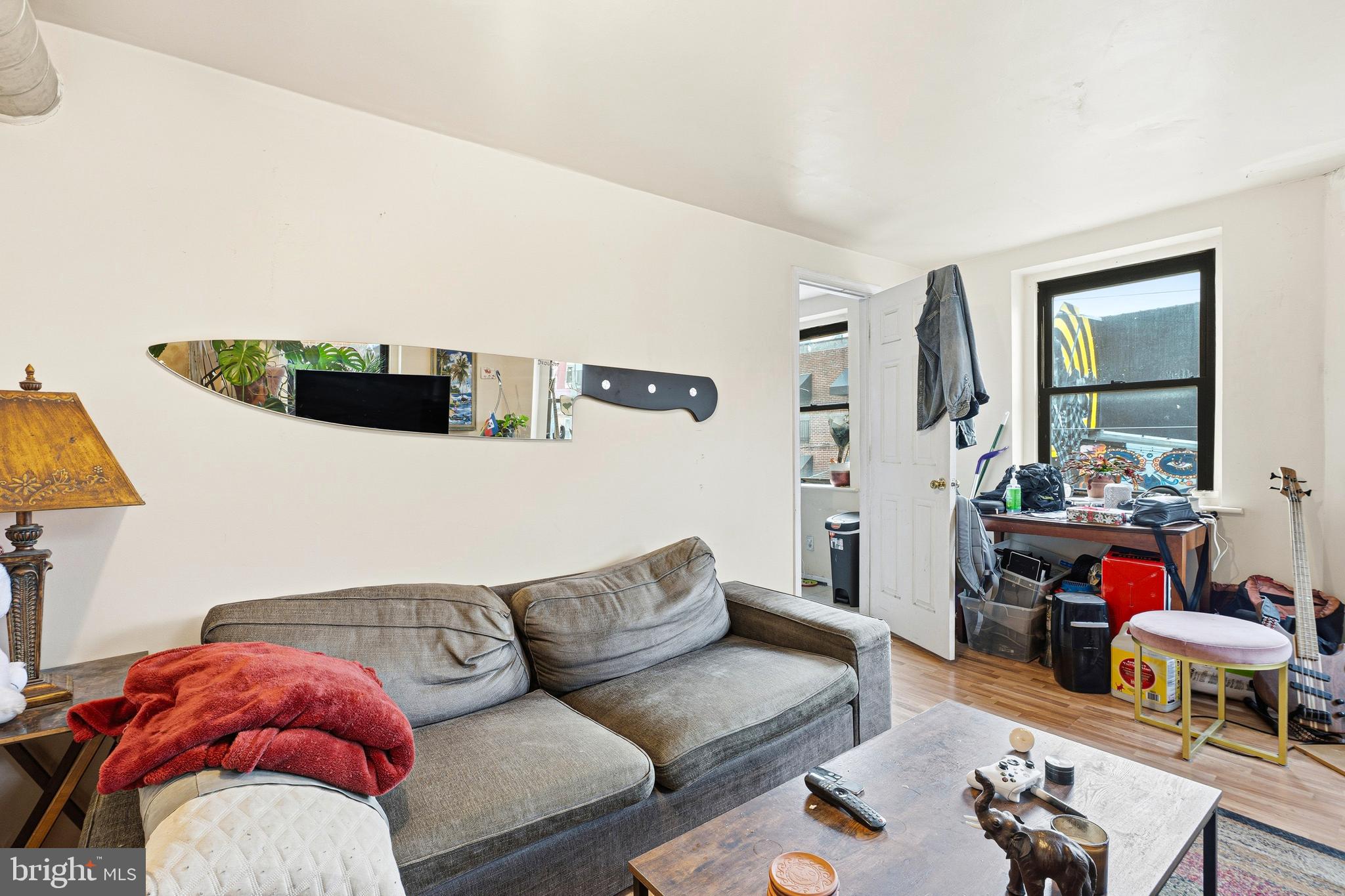 252-254 South Street, Unit 3 Philadelphia, PA 19147 - Photo 2 of 13 a living room with furniture and a couch