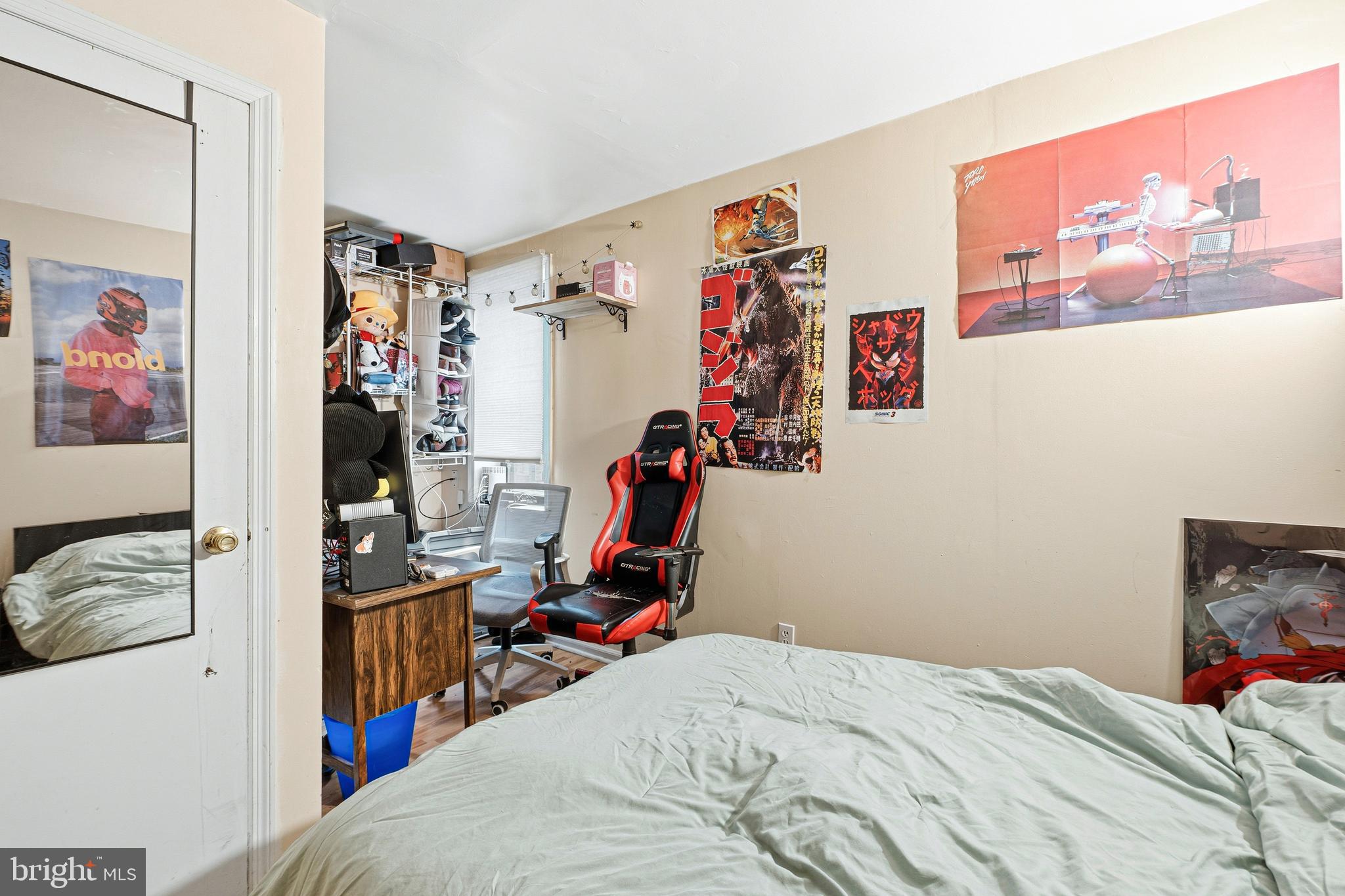 252-254 South Street, Unit 3 Philadelphia, PA 19147 - Photo 9 of 13 a bed room with a bed and a view of a bedroom