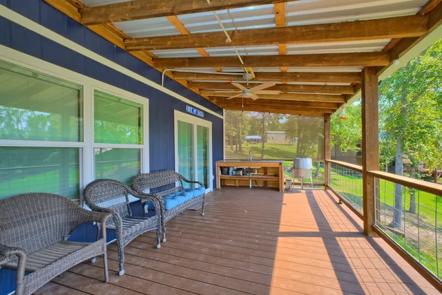 a view of swimming pool with a patio
