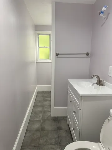 a bathroom with a sink and a vanity