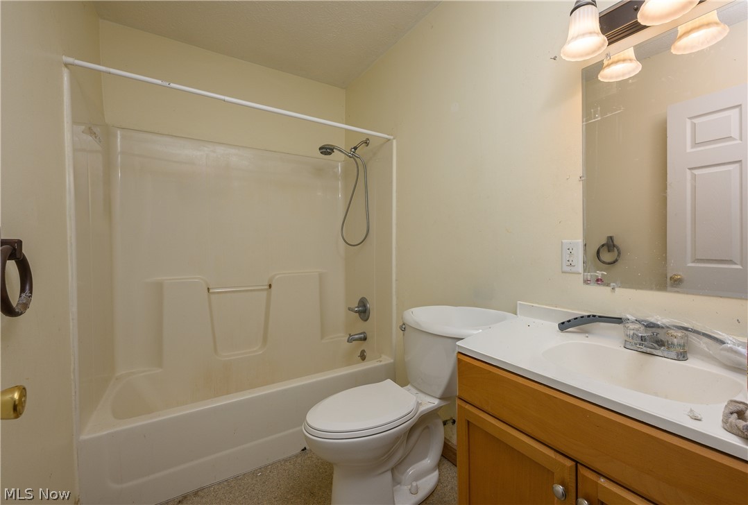 8200 Cutler Road Southwest Sherrodsville, OH 44675 - Photo 22 of 26 Full bathroom with vanity and shower combination
