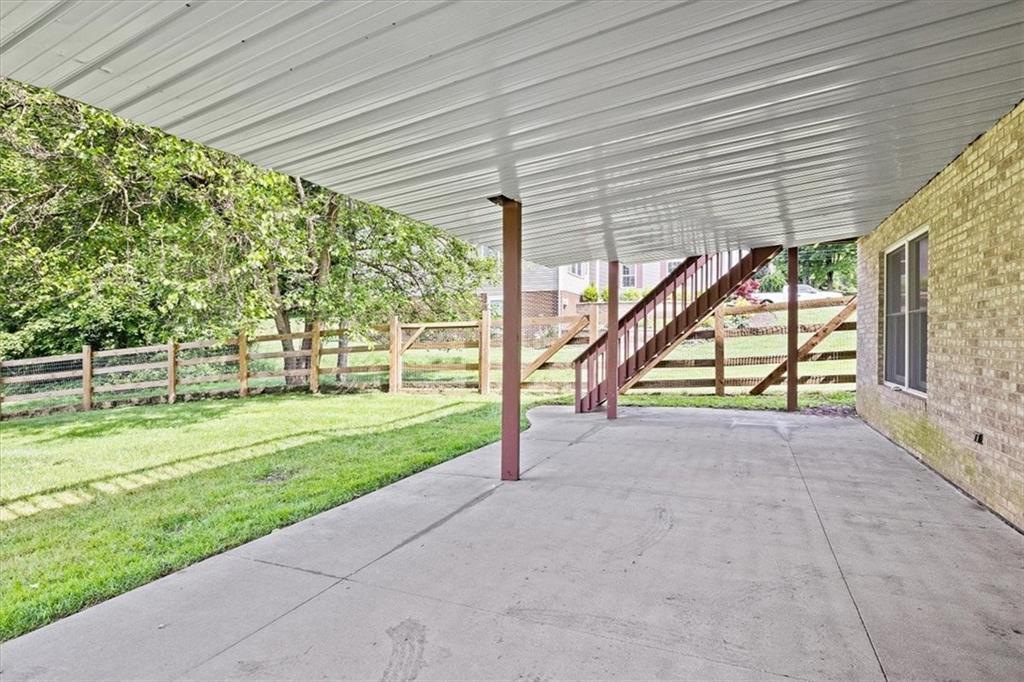341 Shenango Road Beaver Falls, PA 15010 - Photo 24 of 25 The concrete patio is covered and has basement access.