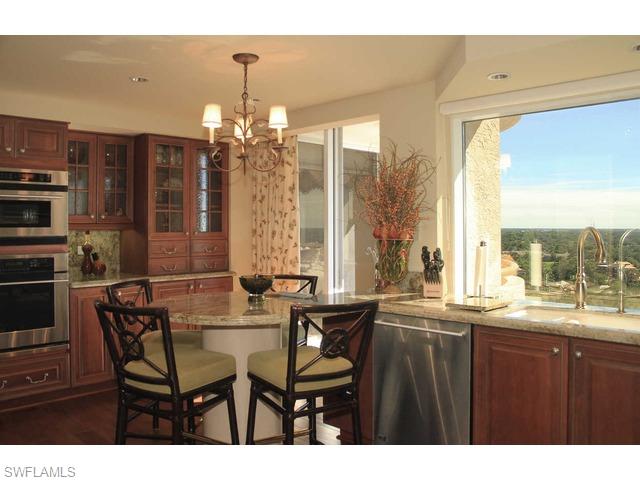 6825 Grenadier Boulevard Naples, FL 34108 - Photo 8 of 11 a dining room with furniture and window
