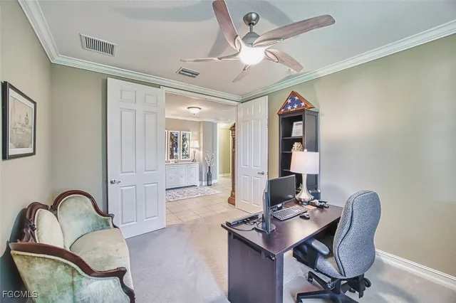 a workspace with furniture and mirror