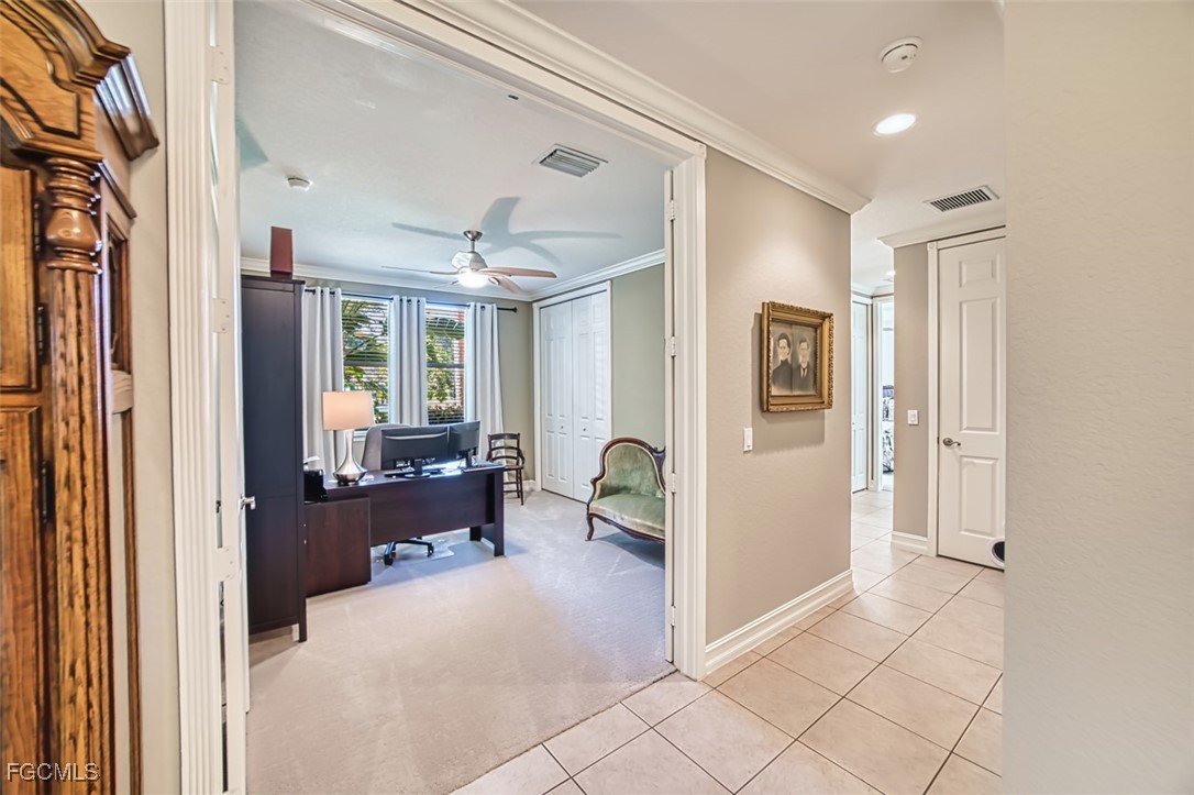 12129 Lucca Street, Unit 102 Fort Myers, FL 33966 - Photo 20 of 40 a bedroom with furniture and a window