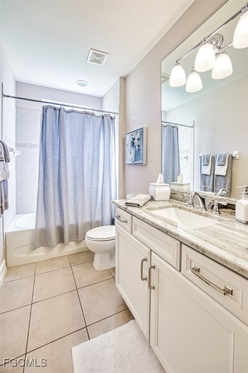12129 Lucca Street, Unit 102 Fort Myers, FL 33966 - Photo 22 of 40 a bathroom with a double vanity sink and a mirror