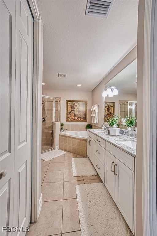 12129 Lucca Street, Unit 102 Fort Myers, FL 33966 - Photo 30 of 40 a large white kitchen with cabinets and furniture