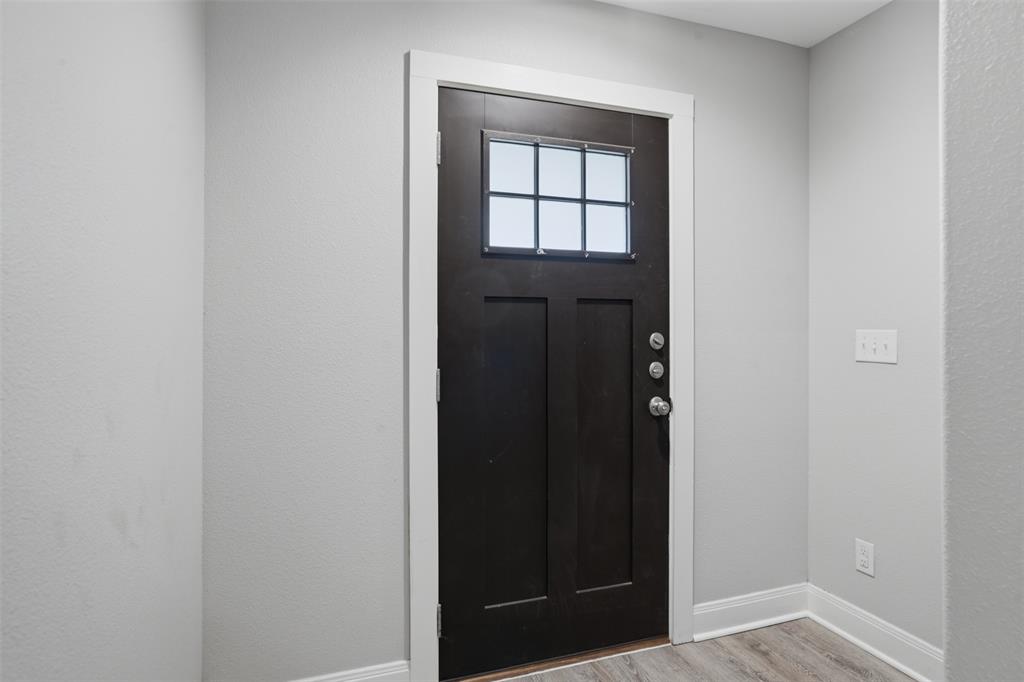 1022 West Shepherd Street, Unit 1022 Denison, TX 75020 - Photo 2 of 27 a view of front door