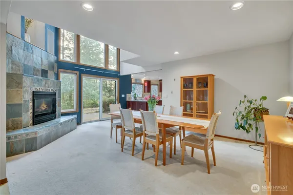 a view of a dining room with furniture window and outside view