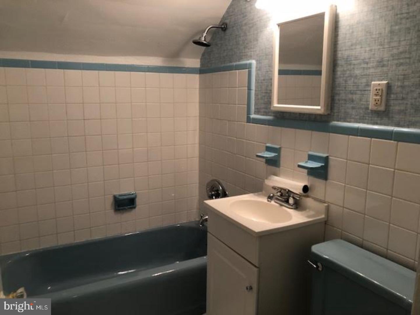 315 Rosemary Avenue Ambler, PA 19002 - Photo 11 of 17 a bathroom with a sink a toilet and shower