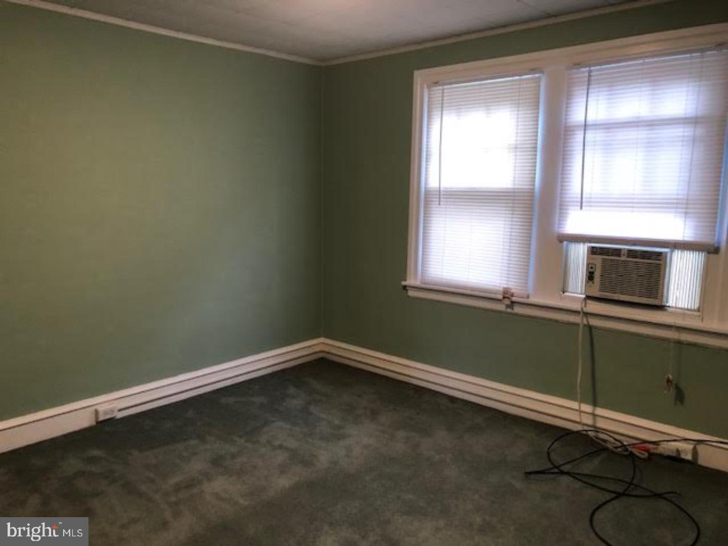315 Rosemary Avenue Ambler, PA 19002 - Photo 12 of 17 a room with a window and a ceiling fan