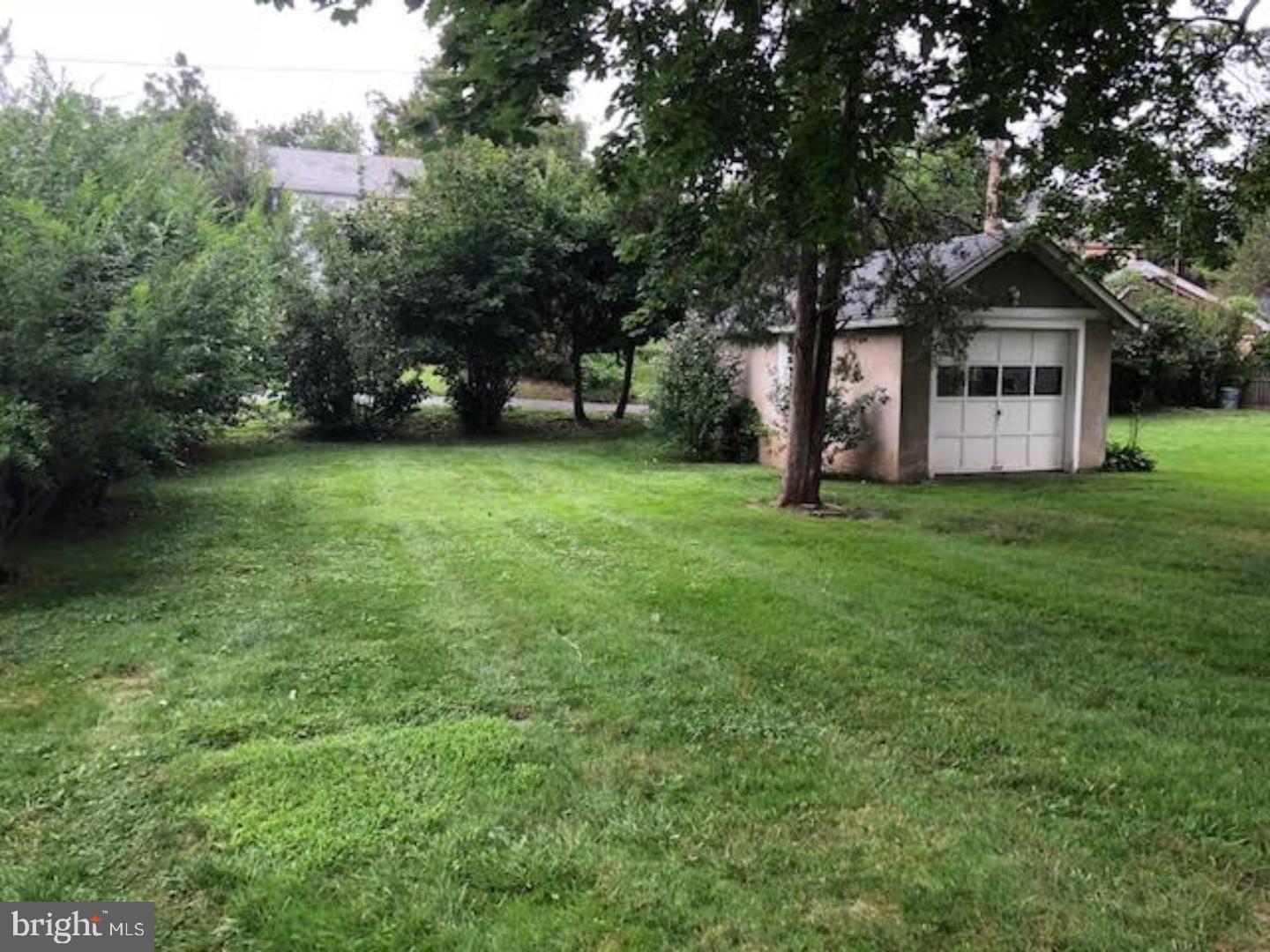 315 Rosemary Avenue Ambler, PA 19002 - Photo 14 of 17 a front view of a house with a yard