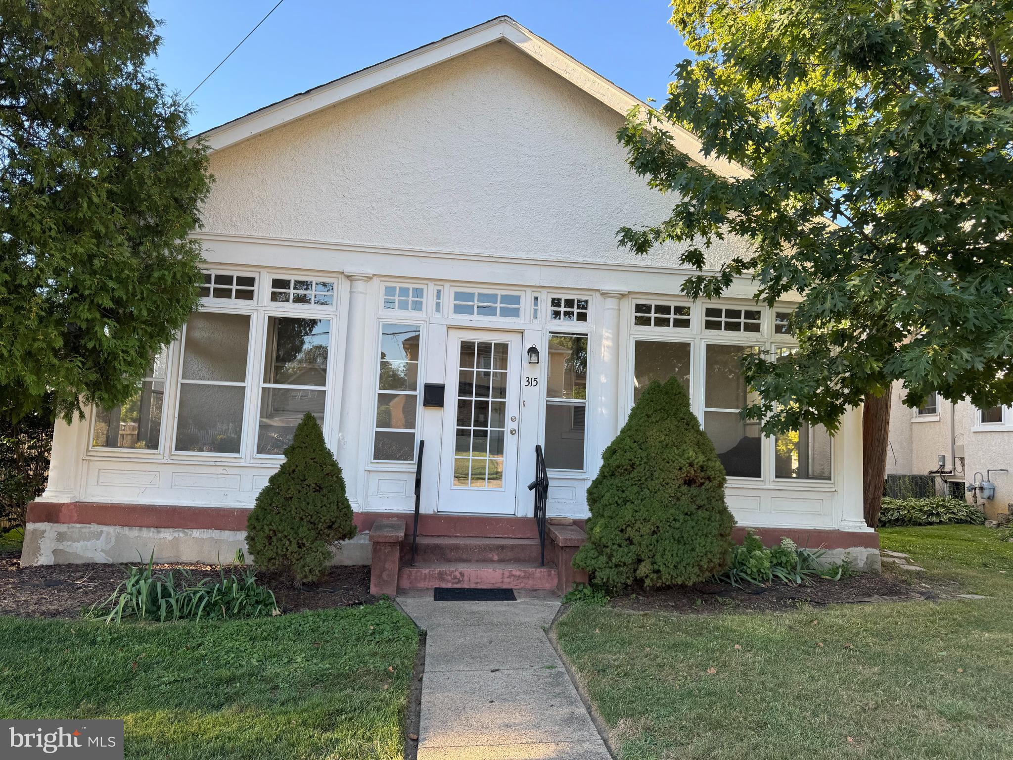 315 Rosemary Avenue Ambler, PA 19002 - Photo 2 of 17 front view of a house with a yard