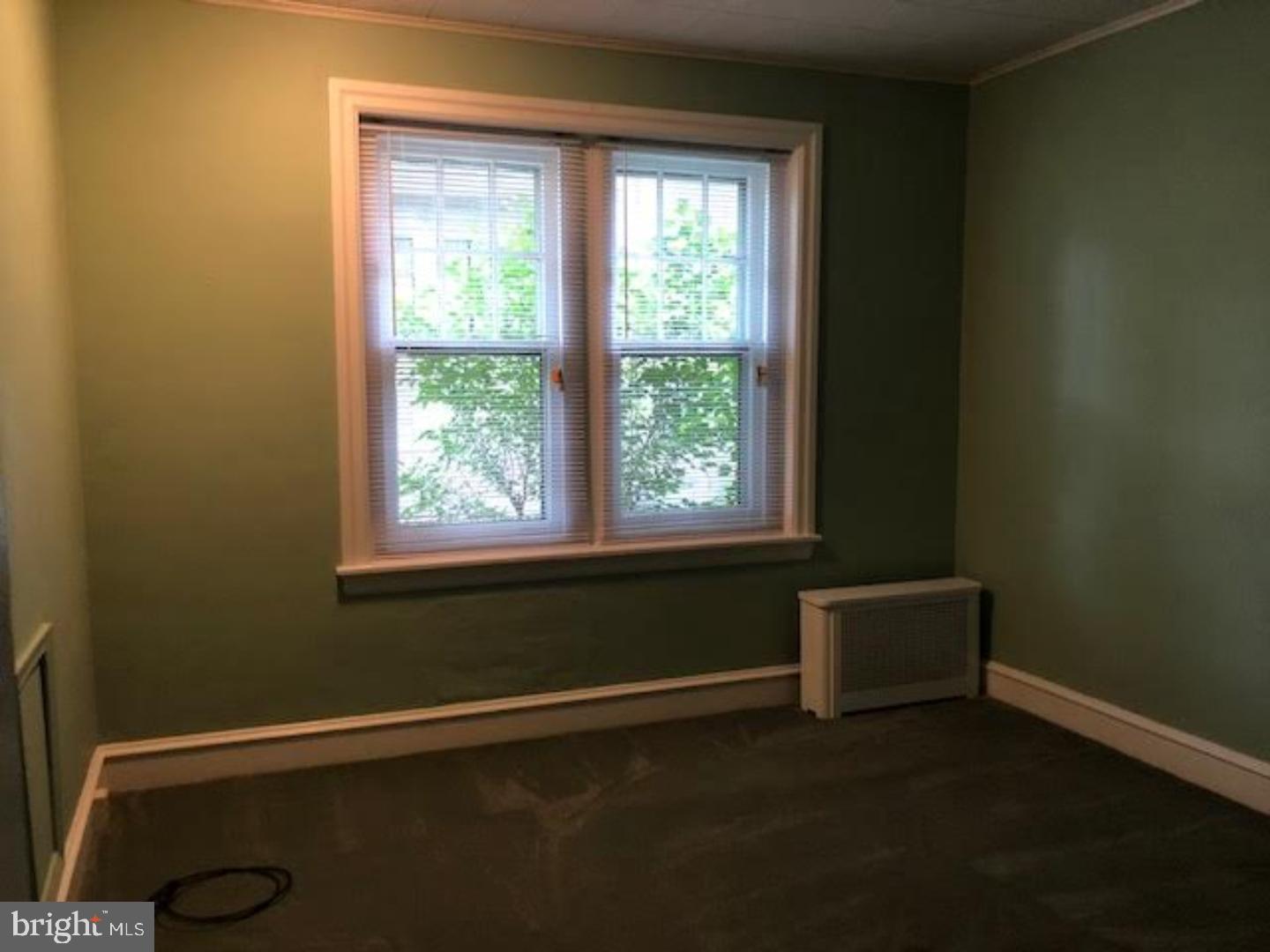 315 Rosemary Avenue Ambler, PA 19002 - Photo 7 of 17 a view of an empty room with a window