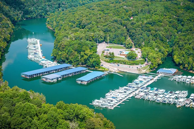 an aerial view of a golf course with chairs