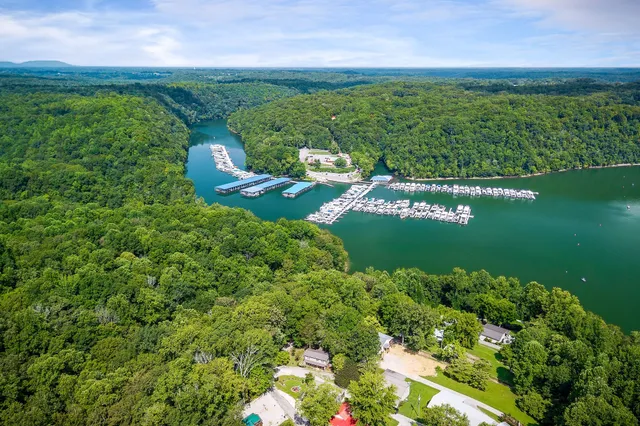 a view of a lake with a building in the back
