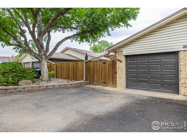 a front view of a house with a garage