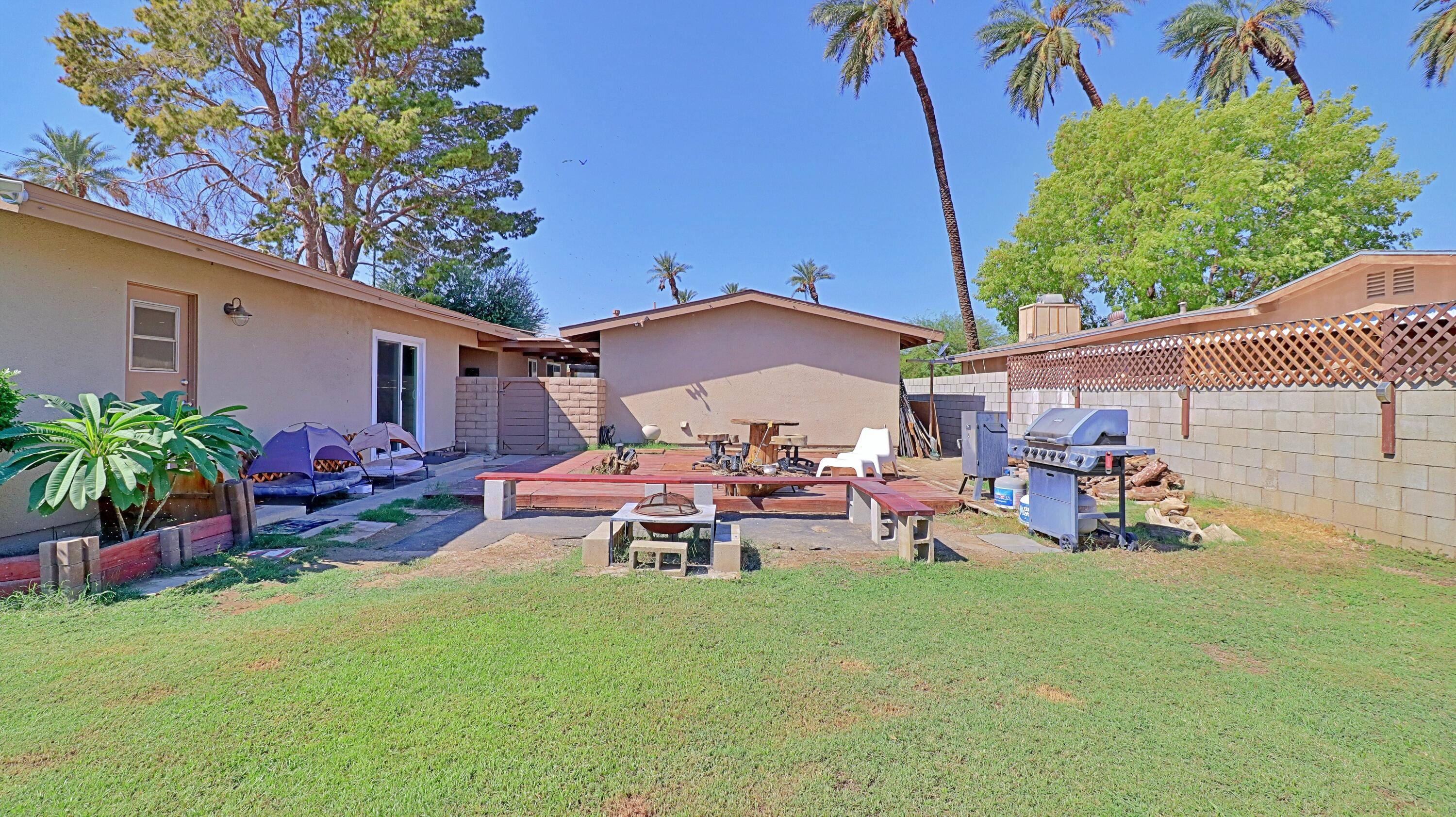 44840 Windsor Drive Indio, CA 92201 - Photo 20 of 26 a view of a chairs and table in patio of the house