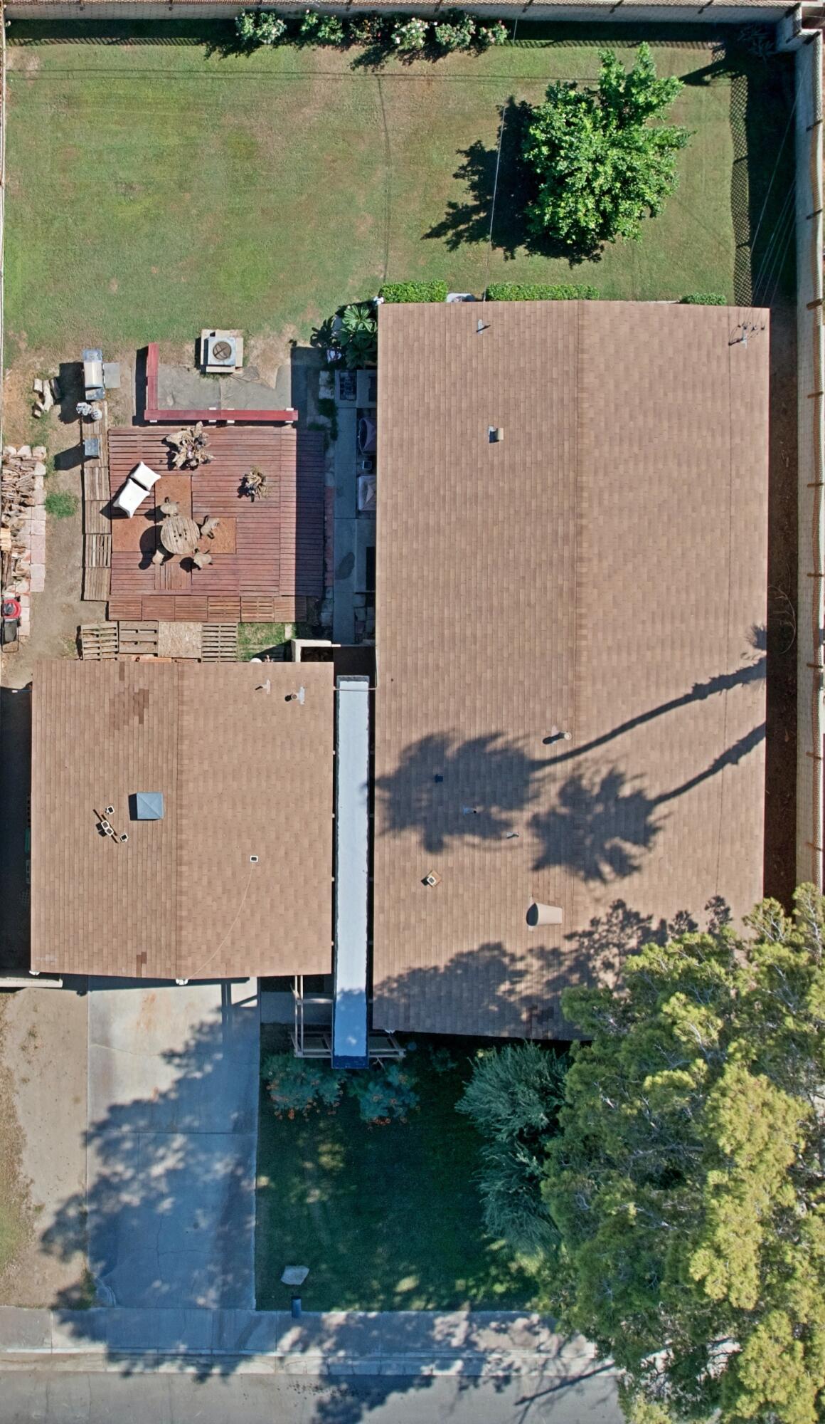 44840 Windsor Drive Indio, CA 92201 - Photo 2 of 26 an aerial view of a house with a yard and lake view