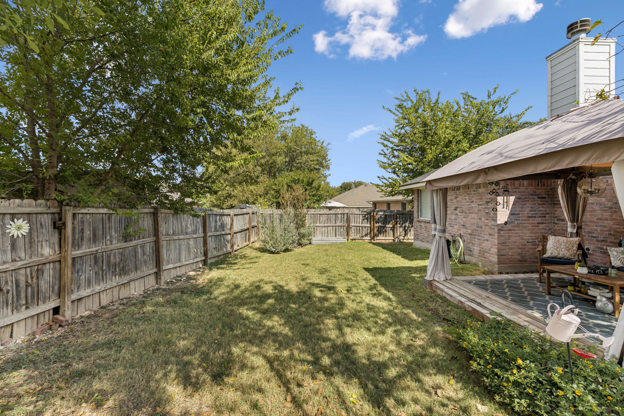 2412 Chestnut Path Round Rock, TX 78664 - Photo 22 of 26 A tranquil private yard with a cozy patio offers an idyllic outdoor retreat.