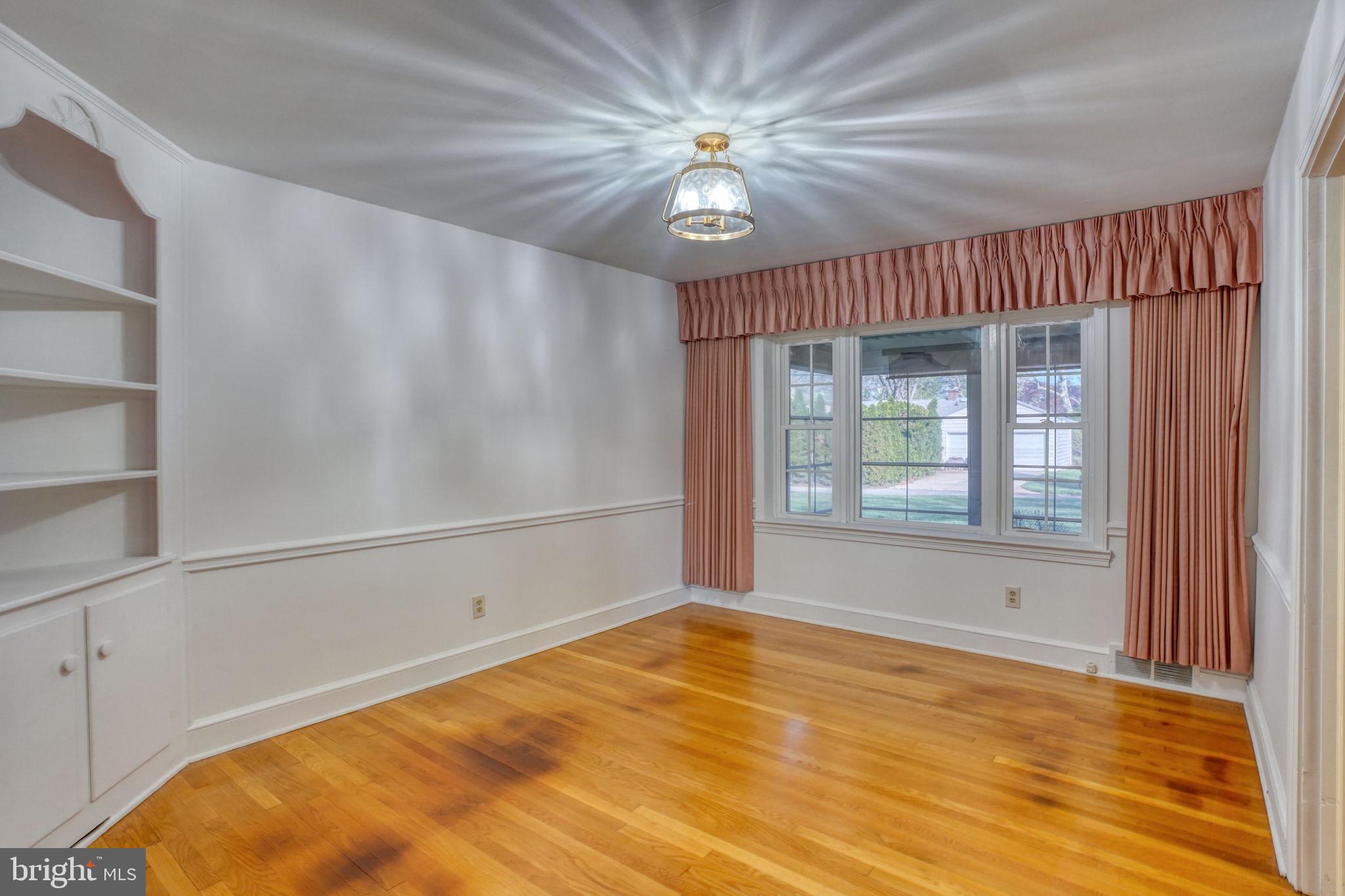 455 East Loockerman Street Dover, DE 19901 - Photo 11 of 55 a view of an empty room with a window