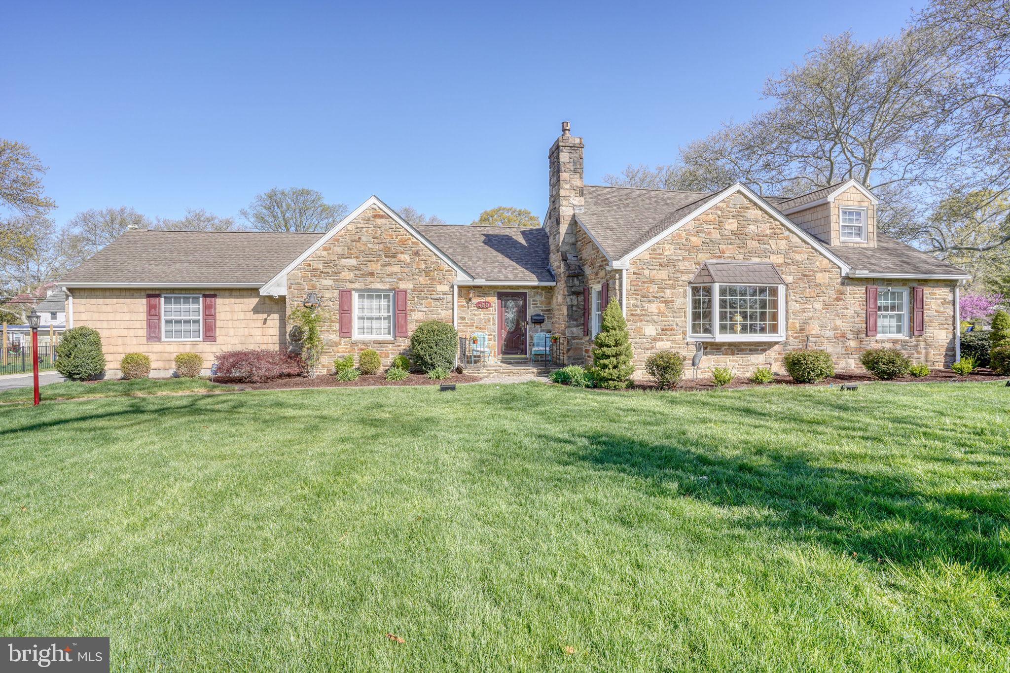 455 East Loockerman Street Dover, DE 19901 - Photo 2 of 55 a front view of a house with a garden and yard