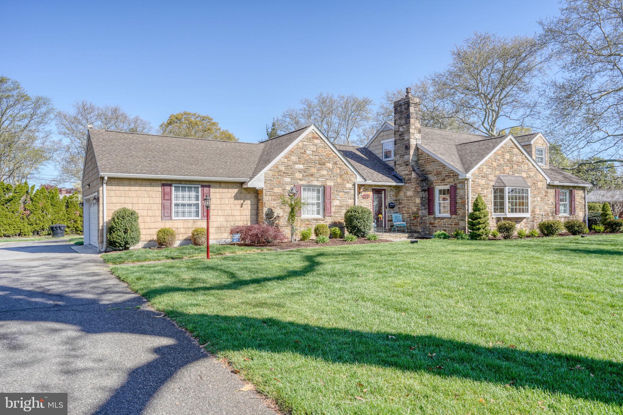 455 East Loockerman Street Dover, DE 19901 - Photo 3 of 55 a front view of a house with a yard
